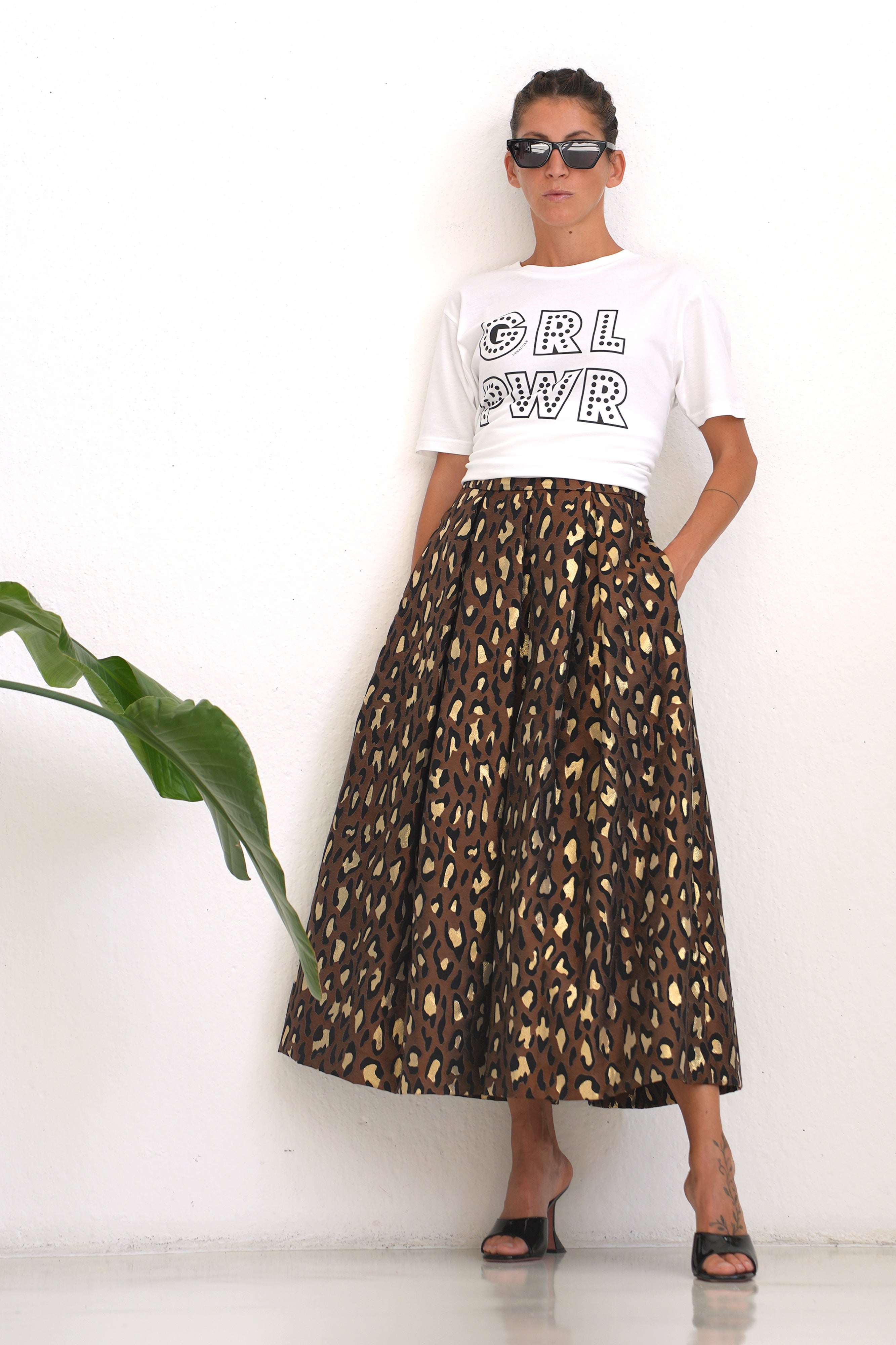 Long brown animalier jacquard pleated skirt with lurex thread, Italian made, styled with a white graphic t-shirt and sunglasses