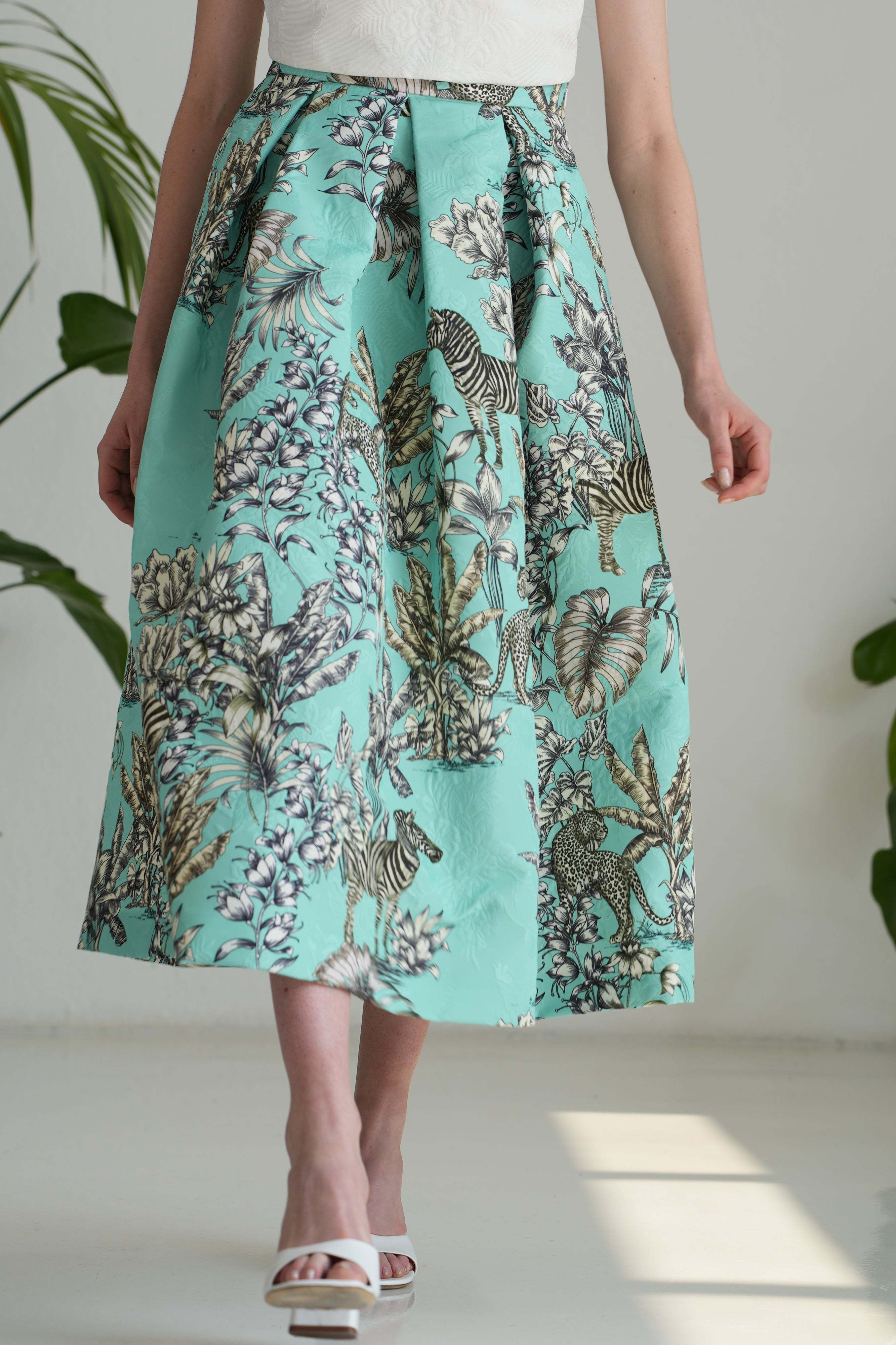 Midi pleated skirt with high waist and zebra print in quilted fabric